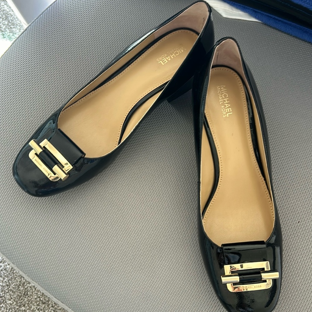 Michale Kors med size 8 worn gently indoor, sole of the shoe looks almost new